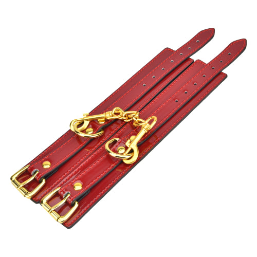 Bound to Please Red Wrist Cuffs – glossy restraints with faux suede lining and quick-release clips – UK discreet delivery