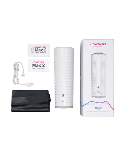 Lovense Max 2 with charging cable, storage pouch, guides and retail box
