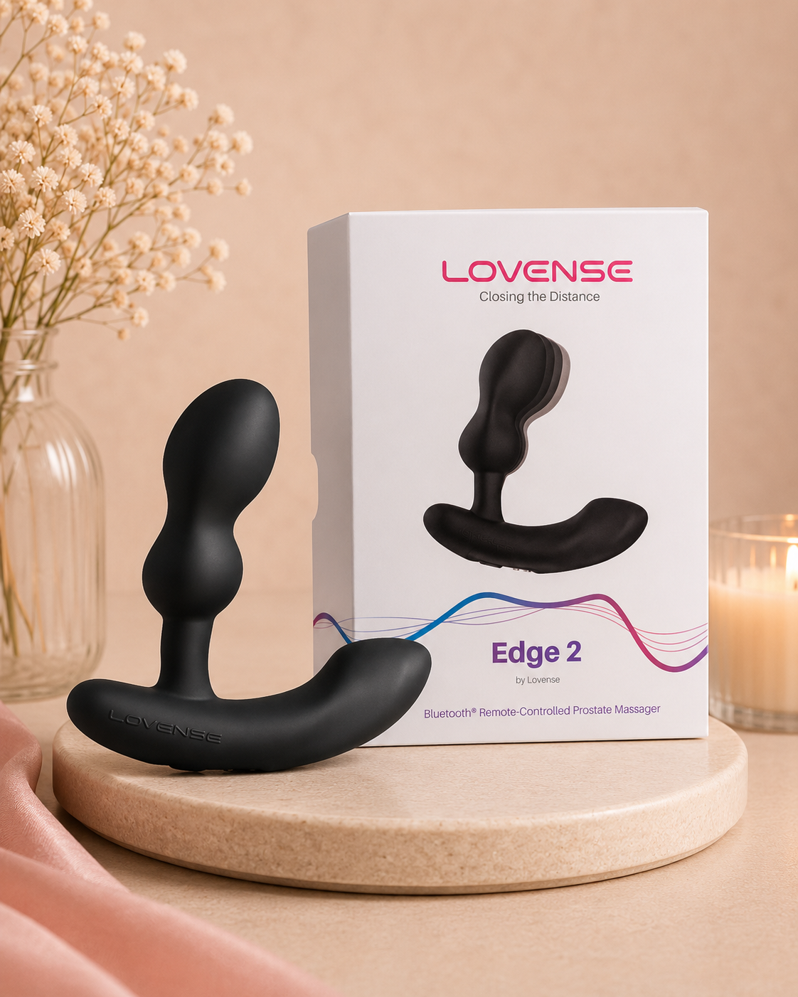 Lovense Edge 2 prostate massager with white packaging displayed on a soft beige luxury background-AlwaysUnder UK-Free Shipping