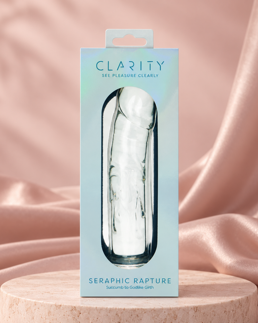 Clarity Seraphic Rapture glass wand package on a blush-pink premium studio set